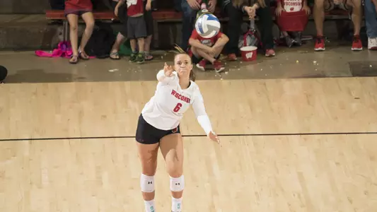 Mallory Dixon serves up the ball vs. Ohio State