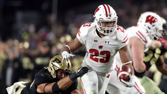 Jonathan Taylor breaks a Purdue defender's tackle attempt on Saturday, Nov. 17 at Ross-Ade Stadium.
