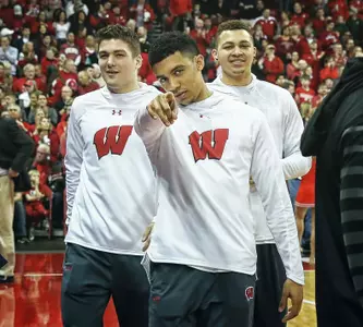 D'Mitrick Trice, Kobe King and Trevor Anderson men's basketball sideline vs. Michigan State 2018