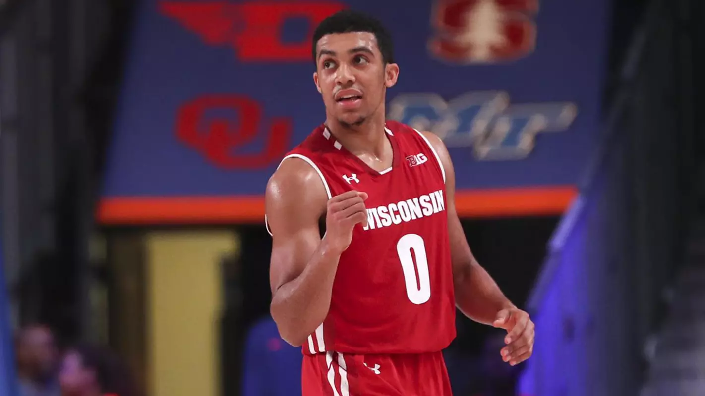D'Mitrik Trice celebrates during the Badgers' win against Oklahoma