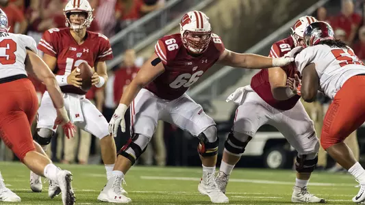Wisconsin Badgers offensive lineman Beau Benzschawel (66) blocks during an NCAA college football game against the Western Kentucky Hilltoppers Friday, August 31, 2018, in Madison, Wisconsin. The Badgers won 34-3. (Photo by David Stluka)