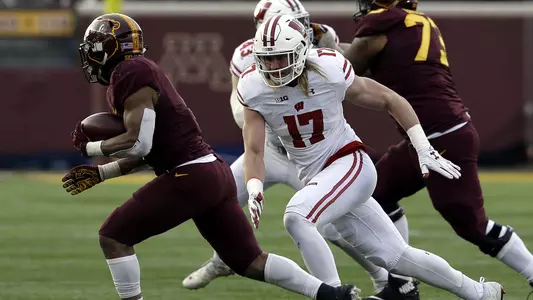 Andrew Van Ginkel chasing down a Minnesota football player Nov. 2017