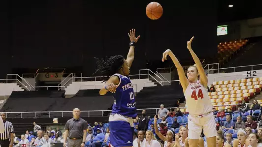Alex Luehring shoots a 3-pointer over a Tennessee State defender