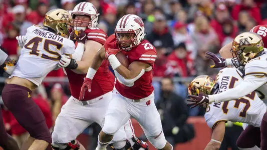 Wisconsins' running back Jonathan Taylor (23) takes on  Minnesota in a NCAA football game at Camp Randal Stadium in Madison Wisconsin on Saturday November 24, 2018.Photo by Tom Lynn/Wisconsin Athletic Communications