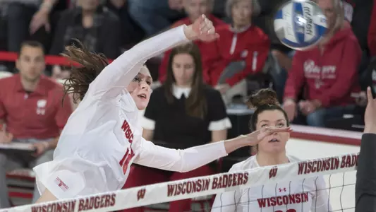 Dana Rettke reaches high for a kill.