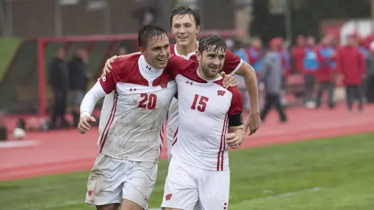 Melick and Leibold celebrate after a goal