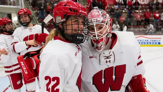 Steffen and Campbell pose for a photo after UW defeats Minnesota, 4-1, on Sunday, Oct. 28