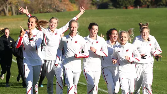 The UW women's cross country team warms up before the 2018 Big Ten Cross Country Championships
