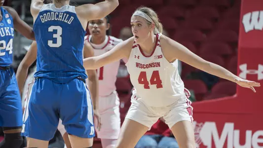Alex Luehring plays defense against Duke