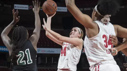 Alex Luehring shoots the ball over a Chicago State defender.