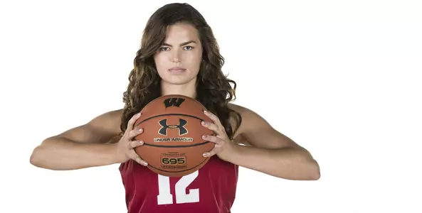 Carmen Backes squeezes a basketball between her hands