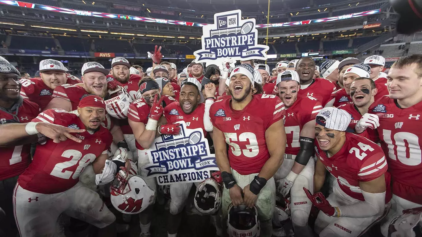 Wisconsin Badgers celebrate their win during the NCAA College Football New Era Pinstripe Bowl game Thursday, December 27, 2018, in New York, New York. The Badgers won 35-3. (Photo by David Stluka)