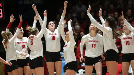 Volleyball bench celebrates vs. Green Bay