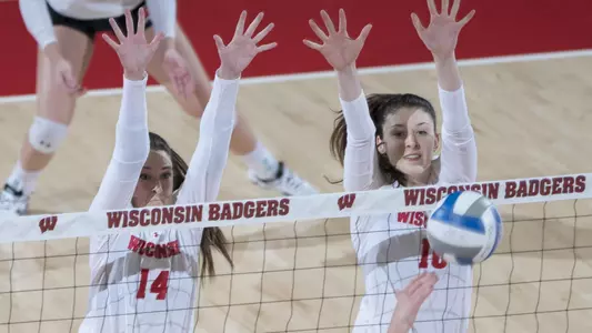 Madison Duello and Dana Rettke go up for a block against Pepperdine.