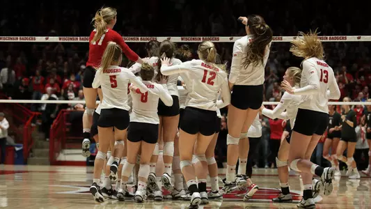 The Badgers celebrate match point over Pepperdine.