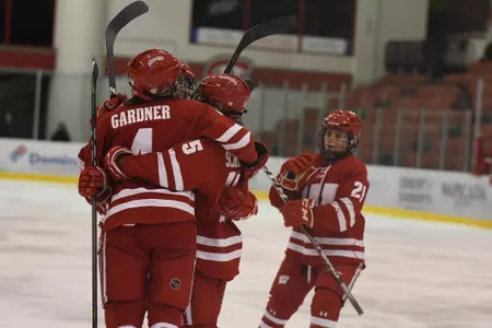 Badgers celebrate one of their goals against SCSU