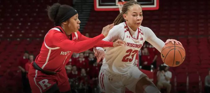 Cayla McMorris drives around a Rutgers defender