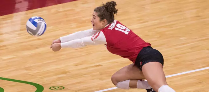M.E. Dodge dives for a ball during a match.