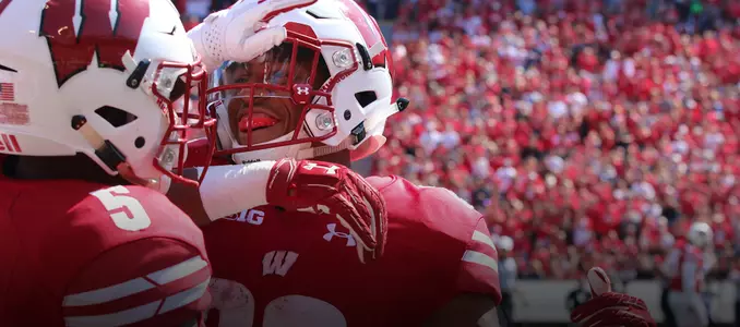 Jonathan Taylor and Chris James celebrate a touchdown vs. Florida Atlantic football 2017