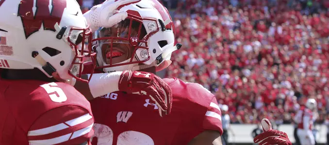 Jonathan Taylor and Chris James celebrate a touchdown vs. Florida Atlantic football 2017