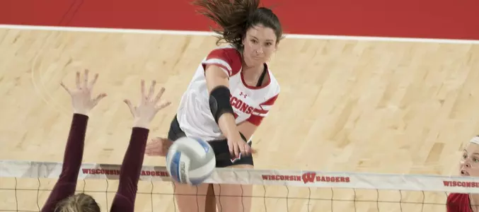 Madison Duello goes for a kill on the right side.