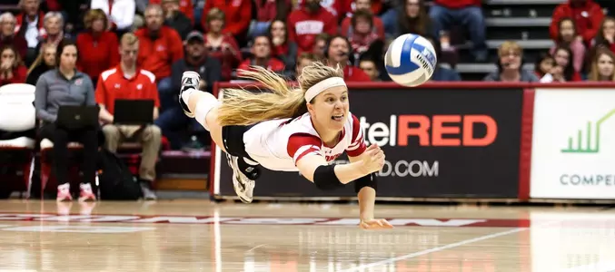 Tiffany Clark goes all out to dig a ball.