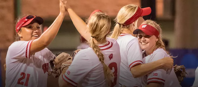 Seniors and freshmen hugging