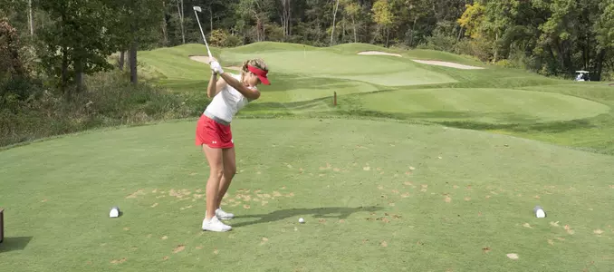 Gabby Curtis tees off during the East-West Match Play Challenge at University Ridge Golf Course on Sept. 17, 2017