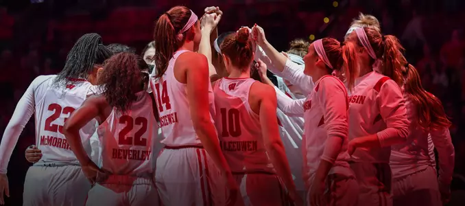 Badger team huddle during pregame