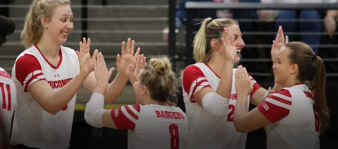 Volleyball team high-fives