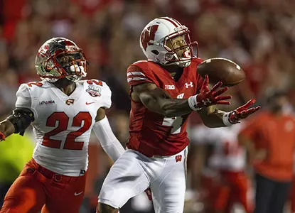 Wisconsin's A.J. Taylor (4) with a near touchdown catch against W. Kentucky.Wisconsin-Madison football team faces Western Kentucky at Camp Randall Field, August 31, 2018 in Madison Wisconsin.Photo by Tom Lynn/Wisconsin Athletic Communications