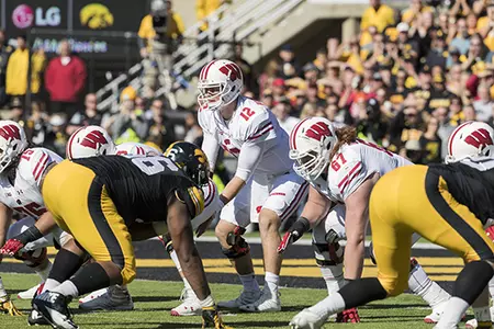 Wisconsin Badgers Alex Hornibrook (12) lines up under center during an NCAA Big Ten Conference college football game against the Iowa Hawkeyes Saturday, October 22, 2016, in Iowa City, Iowa. The Badgers won 17-9. (Photo by David Stluka)