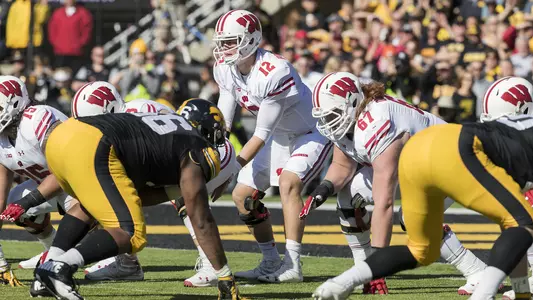 Wisconsin Badgers Alex Hornibrook (12) lines up under center during an NCAA Big Ten Conference college football game against the Iowa Hawkeyes Saturday, October 22, 2016, in Iowa City, Iowa. The Badgers won 17-9. (Photo by David Stluka)