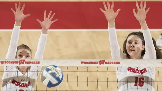 Sydney Hilley and Dana Rettke go up for a block against Ohio State.