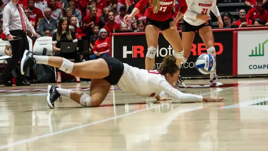 M.E. Dodge goes all out to save a ball.