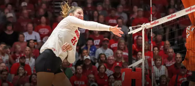 Grace Loberg attacks the ball against Texas
