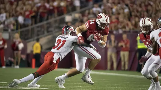 Wisconsin Badgers tight end Jake Ferguson (84) carries the ball during an NCAA college football game against the Western Kentucky Hilltoppers Friday, August 31, 2018, in Madison, Wisconsin. The Badgers won 34-3. (Photo by David Stluka)