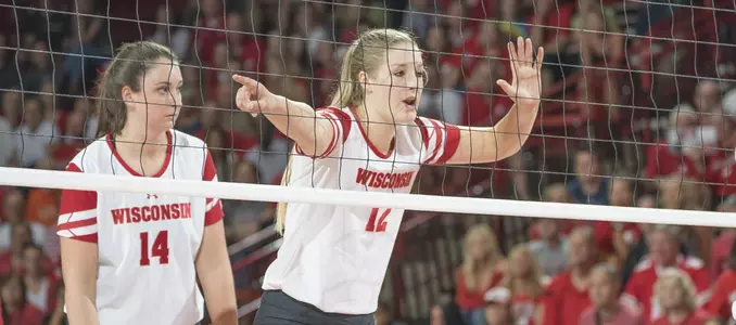 Nicole Shanahan waits at the net for play to start.