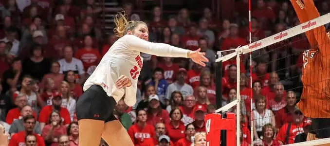Grace Loberg attacks the ball against Texas