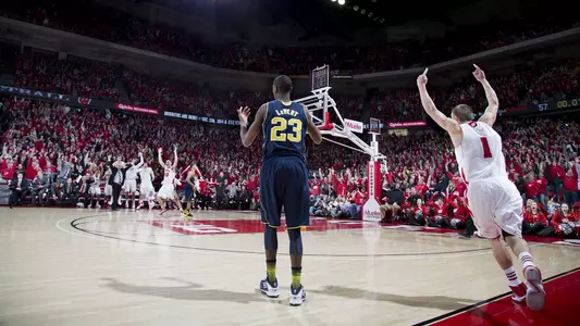 Wisconsin Badgers guard Ben Brust (1) celebrates a 3-pointer as time expires in regulation to tie the game during a Big Ten Conference NCAA college basketball game against the Michigan Wolverines Saturday, February 9, 2013, in Madison, Wis. The Badgers won 65-62 (OT). (Photo by David Stluka)