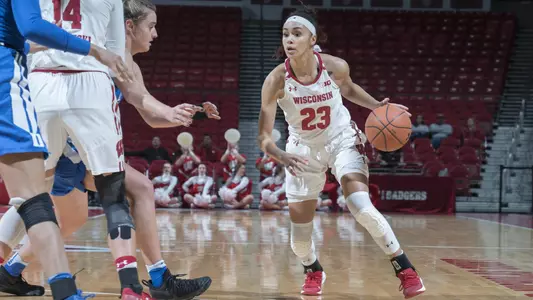 Jasmine Hale dribbles around a Duke defender