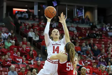 Abby Laszewski shoots over an Indiana defender.