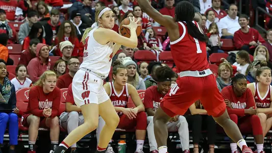 Alex Luehring looks to pass past an Indiana defender.