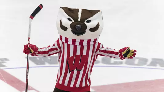 Bucky Badger at a hockey game