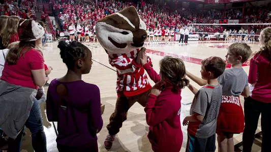 Bucky Badger greets fans as the Wisconsin Badgers' team enters the court before an NCAA Volleyball match against Penn State on Saturday September 28, 2019 in Madison, Wisconsin.Photo by Tom Lynn/Wisconsin Athletic Communications
