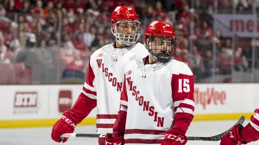 K'Andre Miller and Alex Turcotte