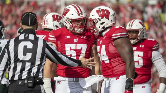 Wisconsin Badgers linebacker Jack Sanborn (57) celebrates with teammate Chris Orr (54) during an NCAA Big Ten Conference college football game against the Michigan State Spartans Saturday, Oct. 12, 2019, in Madison, Wis. The Badgers won 38-0. (Photo by David Stluka/Wisconsin Athletic Communications)