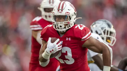 Wisconsin Badgers running back Jonathan Taylor (23) scores a touchdown during an NCAA college football game against the Kent State Golden Flashes Saturday, Oct. 5, 2019, in Madison, Wis. The Badgers won 48-0. (Photo by David Stluka/Wisconsin Athletic Communications)