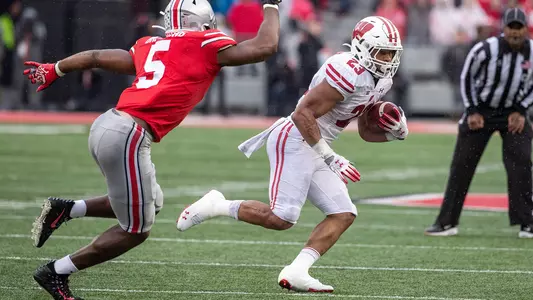 Jonathan Taylor runs the football during a game at Ohio State