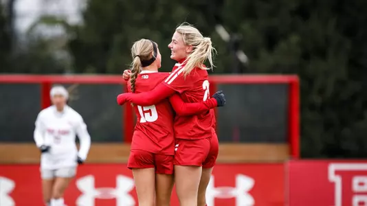 Badgers celebrate a goal against Ohio State